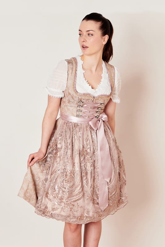 Erlebe die Welt der Eleganz mit dem Dirndl Elisabetta. Dieses taillierte