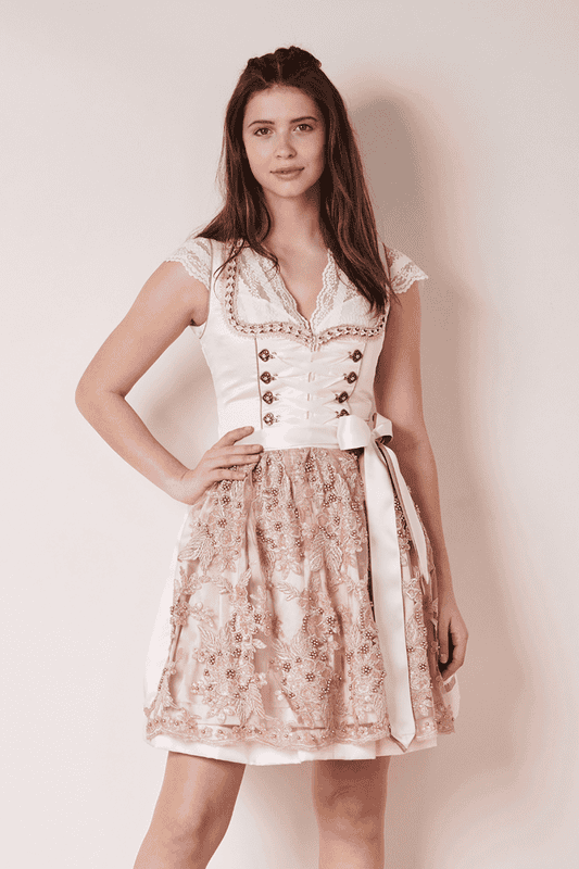 Das Dirndl Siana ist ein wahrer Mädchentraum! Schöne Miederhaken und süße Borten zieren das Mieder. Die Dirndlschürze verzaubert mit toller Stickerei und zahlreichen Perlen und macht so das Dirndl zum Eye-Catcher!