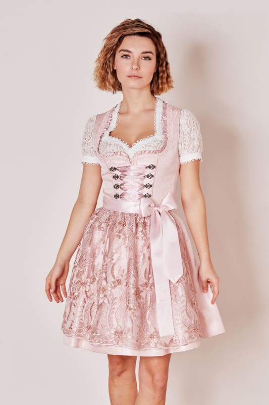 Eleganz trifft auf Modernität mit dem Dirndl Alya. Das Dirndl ist tailliert geschnitten