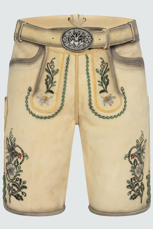 Diese stilvolle Herren Lederhose Darian vereint traditionelle Handwerkskunst mit praktischen Details. Verziert mit feinen Stickereien auf dem Hosenbein und dem Latz